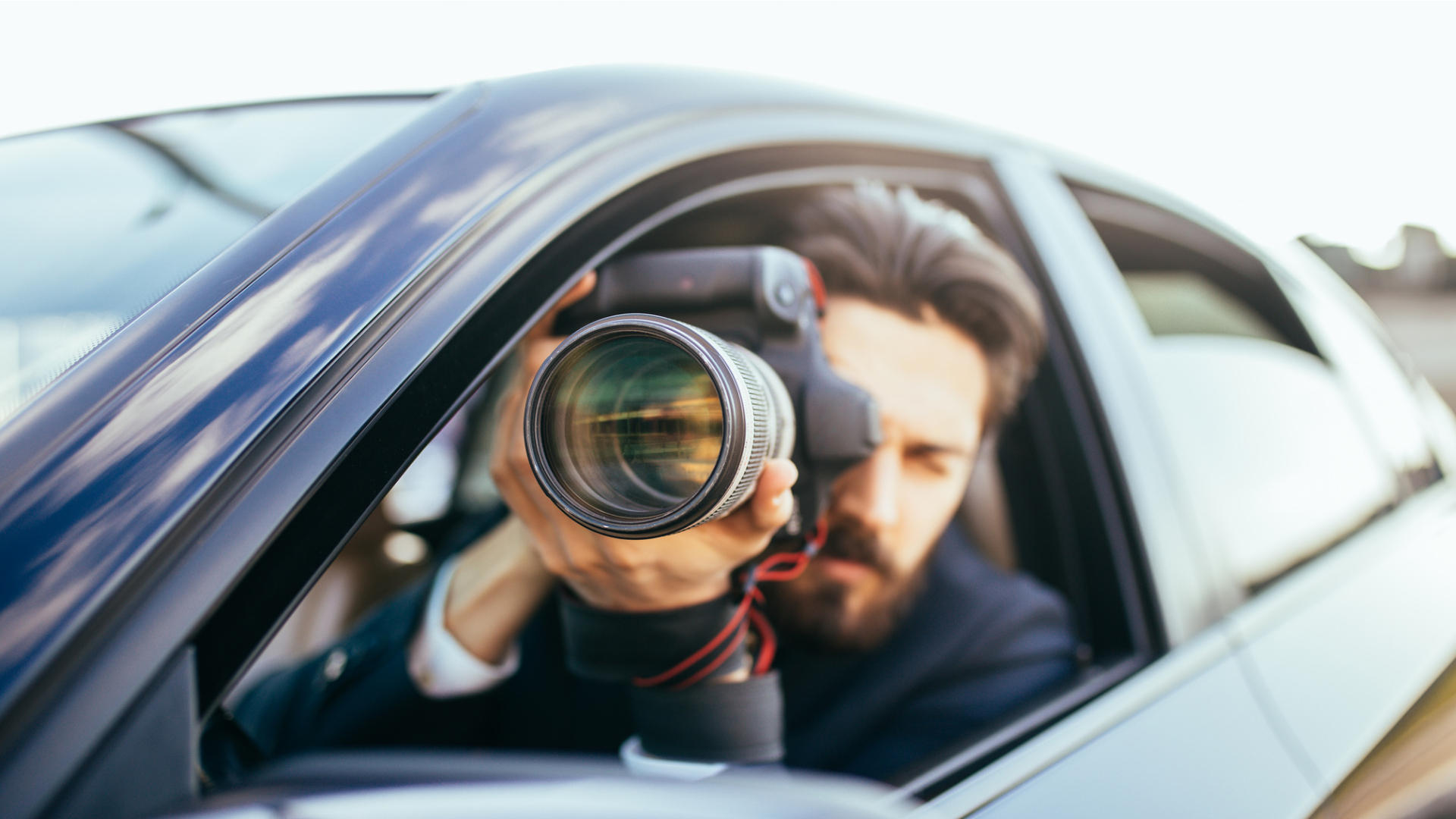 covert surveillance Oklahoma investigator using camera from vehicle to document behavior