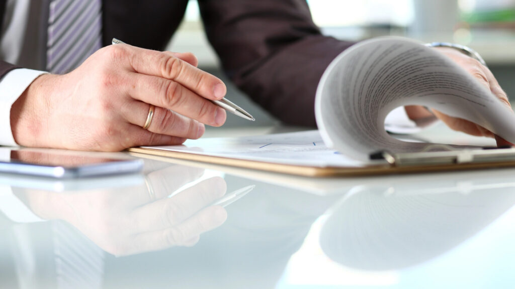 Fraud investigation document review analyzing financial records and paperwork